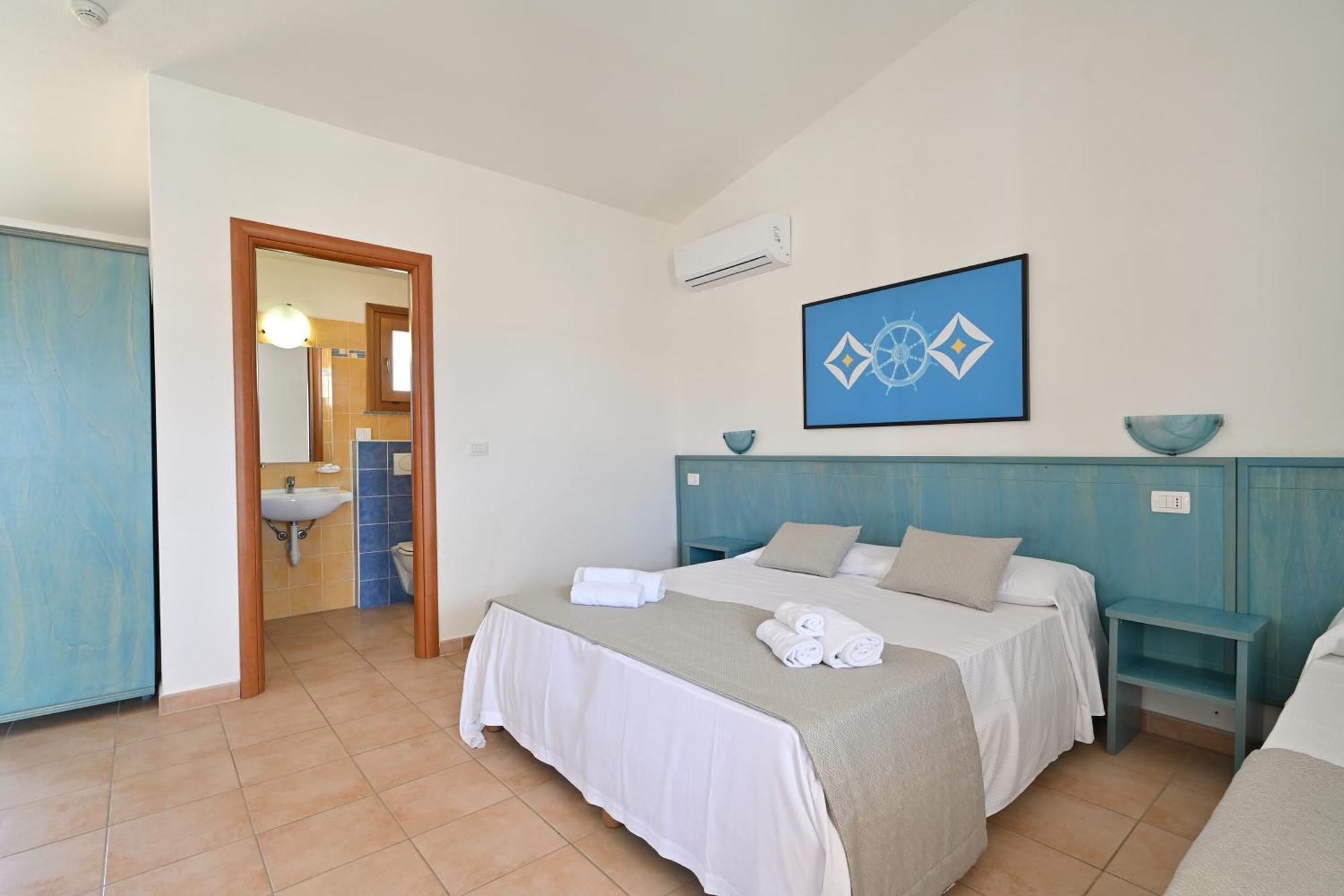 באדזי Hotel Club Baia Delle Mimose מראה חיצוני תמונה